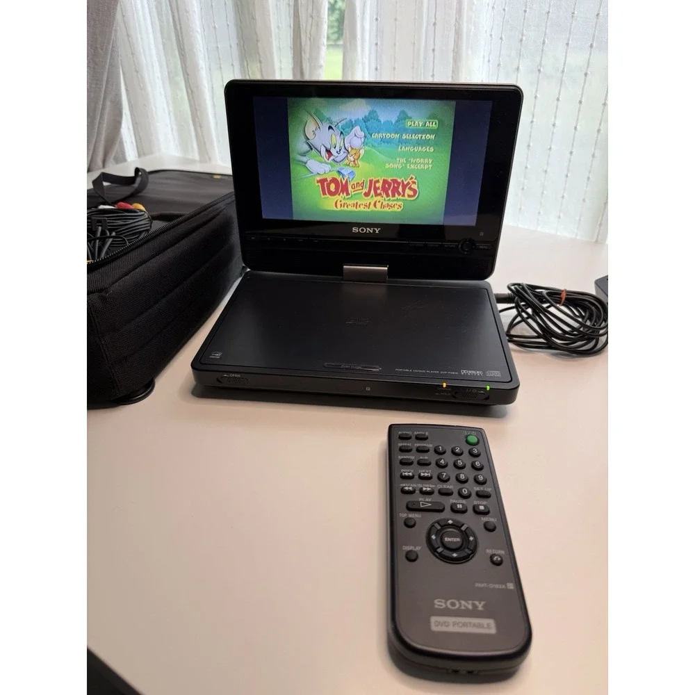 Sony Portable DVD Player DVP-FX810 W/ Remote, Adapter, Audio, Case & More WORKS